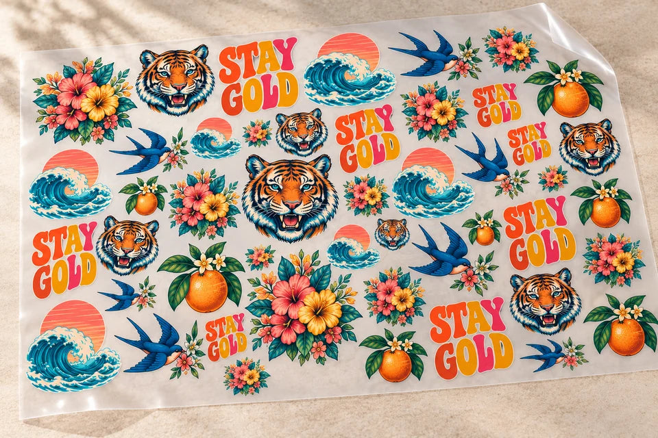 Gang sheet filled with colorful transfer designs.